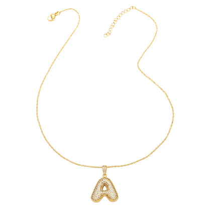 a bubble letter necklace gold 