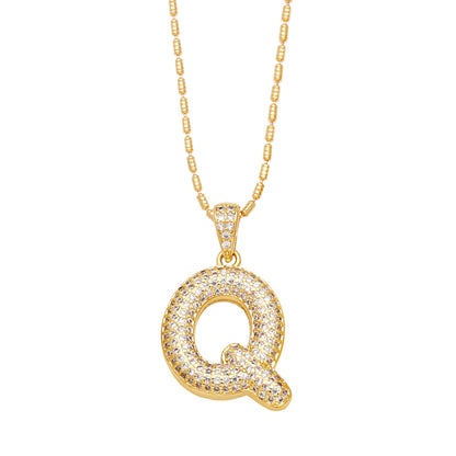 q bubble letter necklace gold 