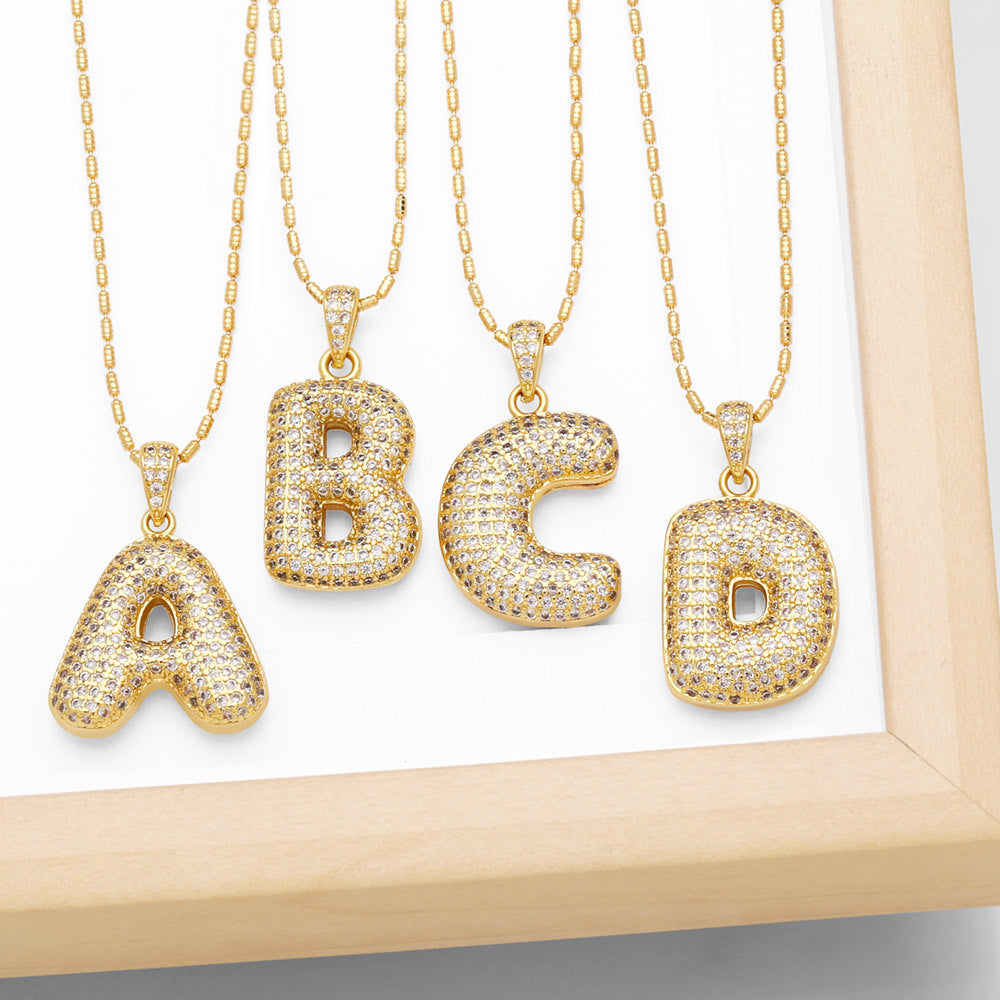 bubble letter necklace gold 